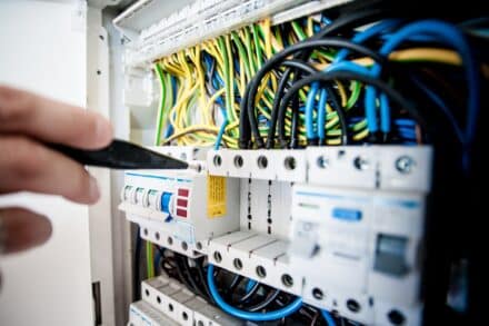 An EICR is conducted by a qualified electrician