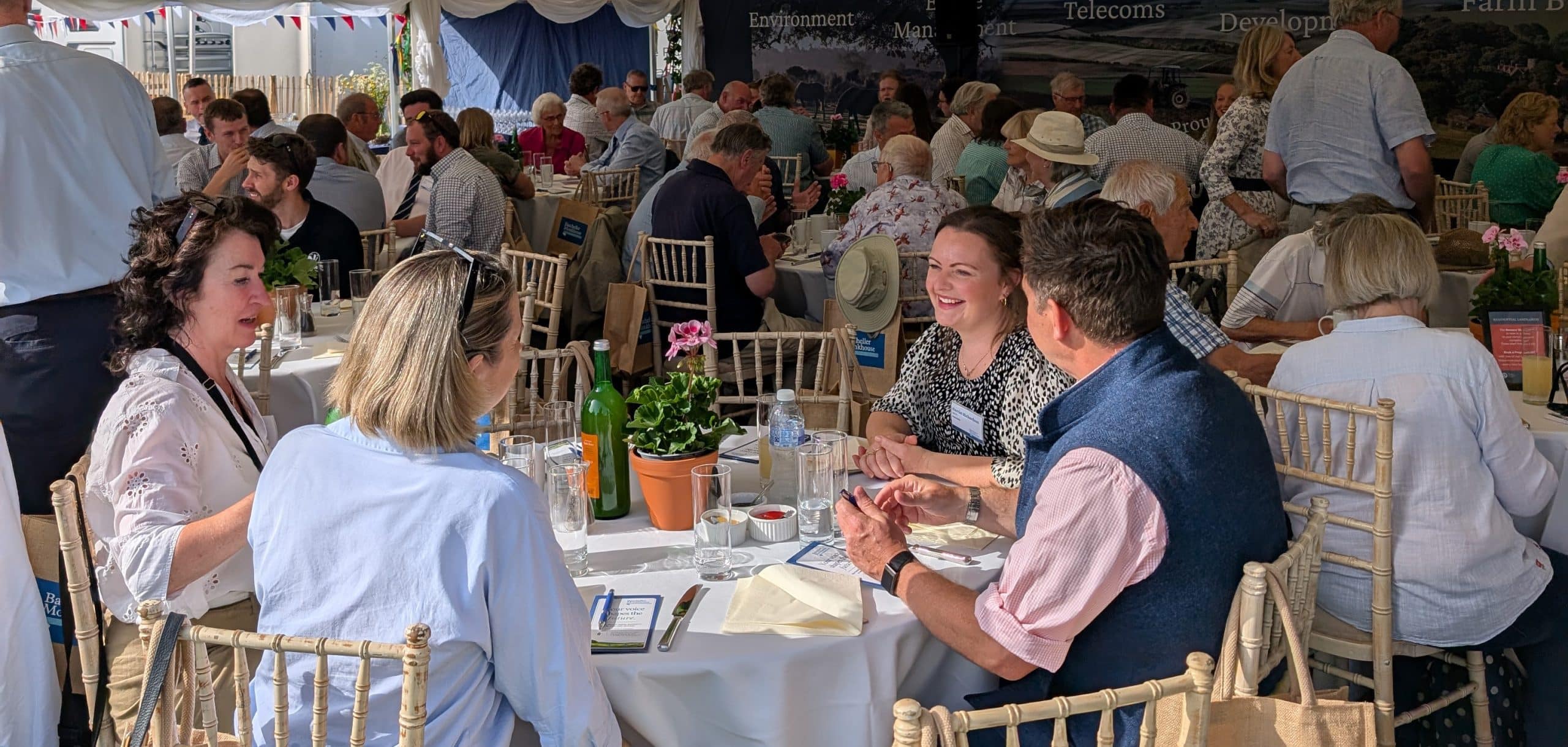 Guests enjoying breakfast at the Batcheller Monkhouse marquee